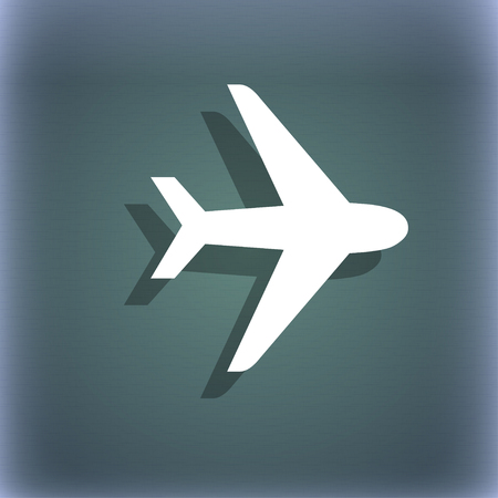 Plane icon symbol on the blue-green abstract background with shadow and space for your text. illustrationの写真素材