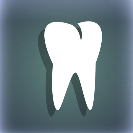 tooth icon. On the blue-green abstract background with shadow and space for your text. illustrationの写真素材