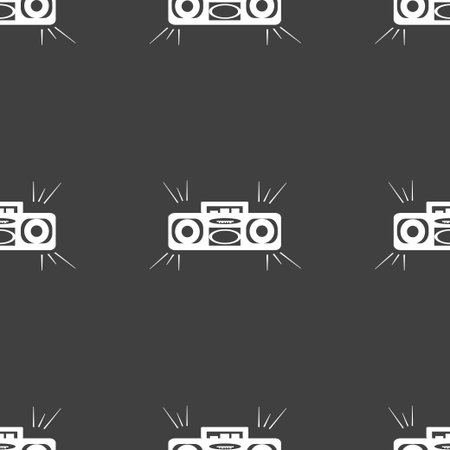 Radio cassette player icon sign. Seamless pattern on a gray background. Vector illustrationのイラスト素材