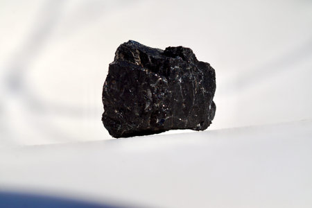 Black rough tourmaline, for healing.