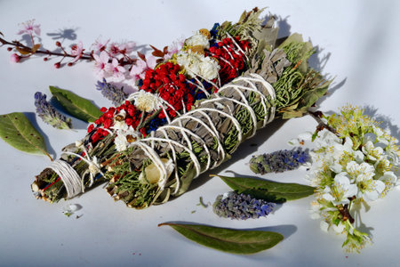 Smudge stick bundle of herbs for energetic healing and cleansing.の写真素材