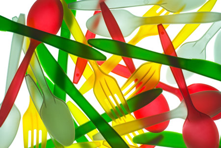 Full background of colorful plastic Cutlery