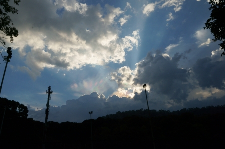 uncommon phenomenon of rainbow color light flare in the sky. photo taken by J.Y. at FRIM, malaysia.のeditorial素材