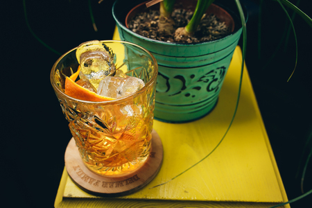 old fashioned classic cocktail in crystal glassの写真素材