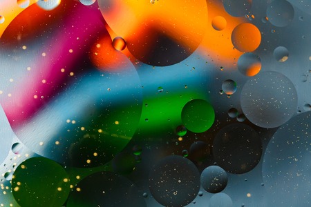 Beautiful abstract space background, mixed drops and water and oil.の写真素材