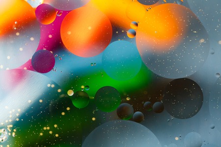 Beautiful abstract space background, mixed drops and water and oil.の写真素材