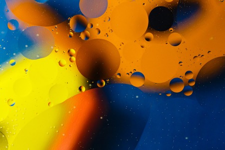 Beautiful abstract space background, mixed drops and water and oil.の写真素材