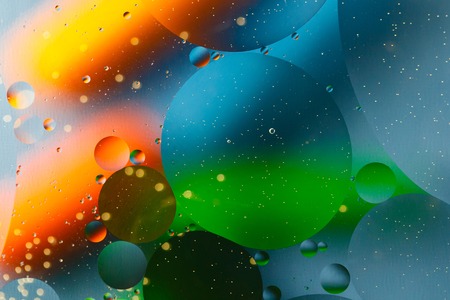 Beautiful abstract space background, mixed drops and water and oil.の写真素材