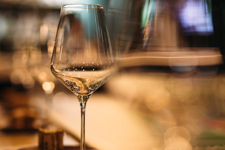 Empty wine glasses closeup. In a row, focus on foreground.