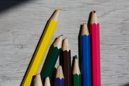 broken crayons on the floor, colorful pencilsの写真素材