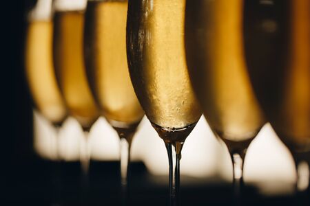 glasses of white sparkling wine champagne lot of close-ups.の写真素材