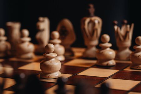 wooden chess Board with chess pieces.の写真素材