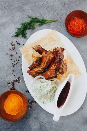 pork ribs grilled on a gray background top view with copy space.の写真素材