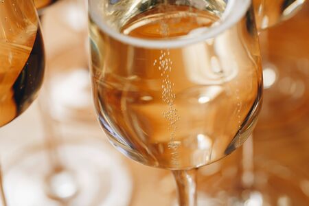 Champagne glasses on table closeupの写真素材