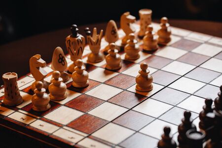 wooden chess Board with chess pieces.の写真素材