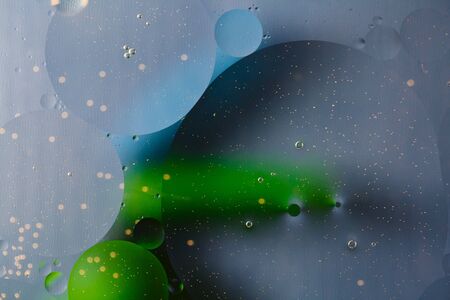 Beautiful abstract space background, mixed drops and water and oilの写真素材