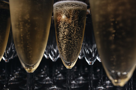 Close-up the glasses of the champagne on a table.の写真素材