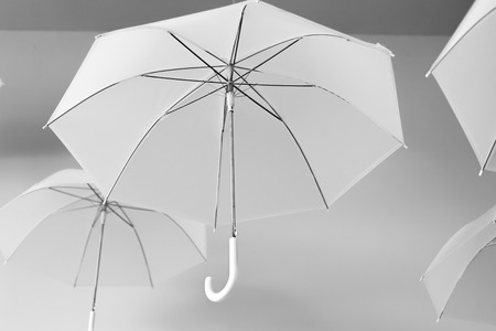 Hanging white umbrellasの写真素材