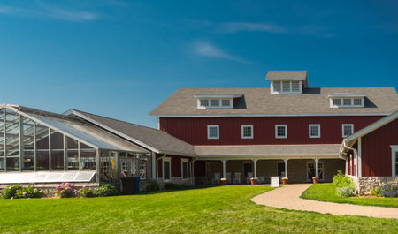 Buildings of a farm in a suburban area