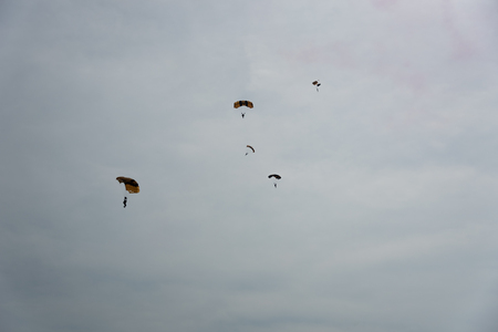 Parachutist in the sky on a cloudy dayのeditorial素材