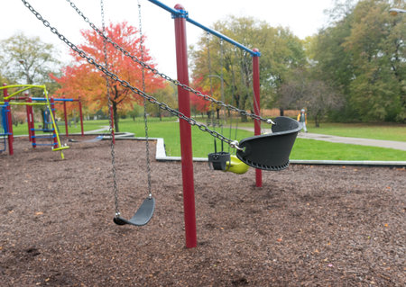 Swings on a kids playground in the park