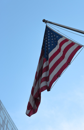 American flag on a building on Chicago streetの写真素材