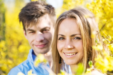 Young loving, having fun couple in summer sunny park  Love story の写真素材