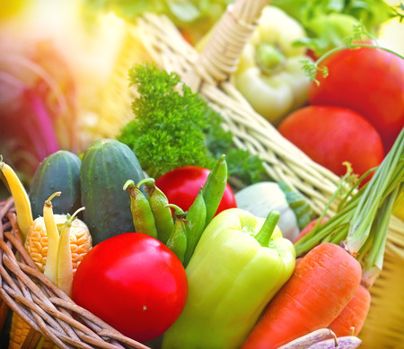 Fresh organic vegetables in wicker basketsの写真素材