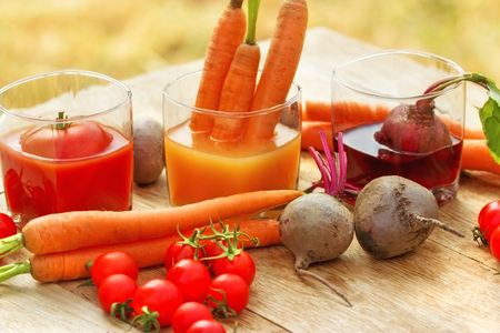 Carrot juice, tomato juice and beet juiceの写真素材