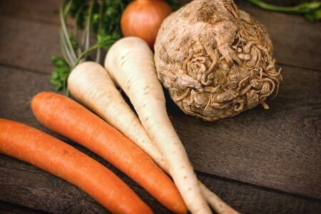 Parsley, carrot and celery - healthy root vegetablesの写真素材