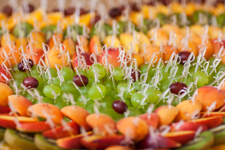 Fruit dessert with white swordsの写真素材