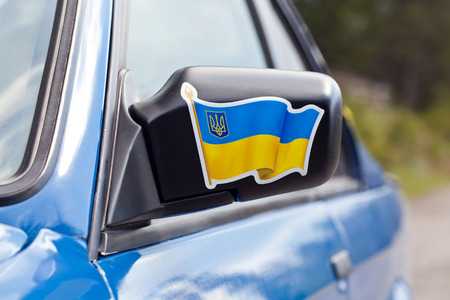 Blue sport car mirror close-upの写真素材