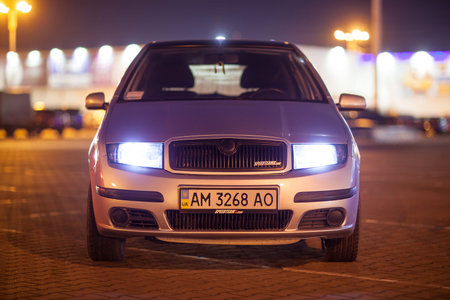 Kiev, Ukraine - February 28, 2015: Front-side view of silver car.