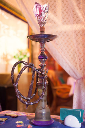 Close-up photo of hookah with tube