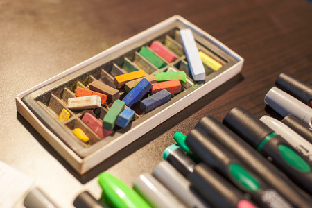 Box with color clay on the tableの写真素材