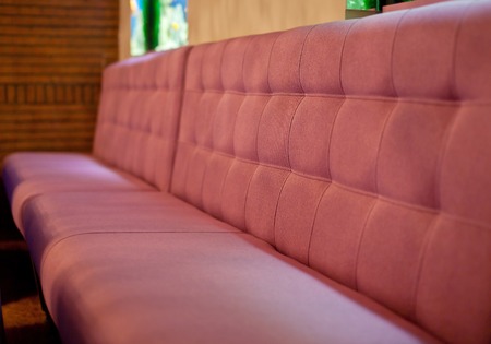 Red Sofa in the cafe. Side viewの写真素材