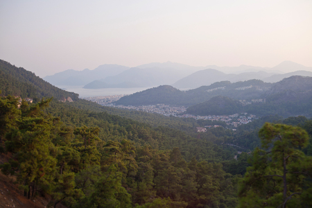 Evening view of the city of Marmaris, the mountains and the sea.の写真素材