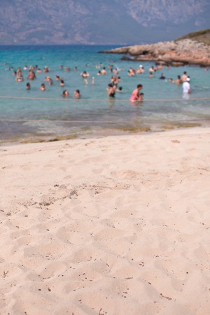 People swim in the sea. Cleopatra's Beach on the island of Sedir. Turkey. Blurred.の写真素材