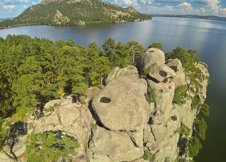 Stone rock on a mountain lake Borovoe (Burabay) in Kazakhstan.の写真素材