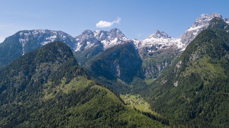 Aerial view of mountain range with snow in the alpine mountains.の写真素材