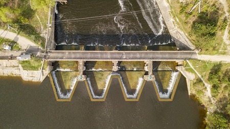 Aerial view of the dam with the road on the river.の写真素材