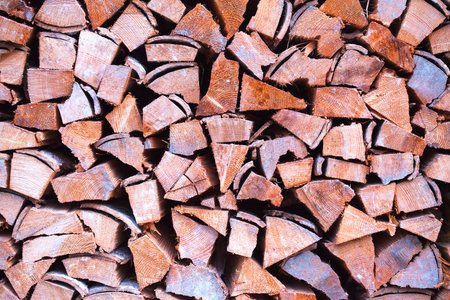 Beautifully folded wooden blocks lie under a canopy.