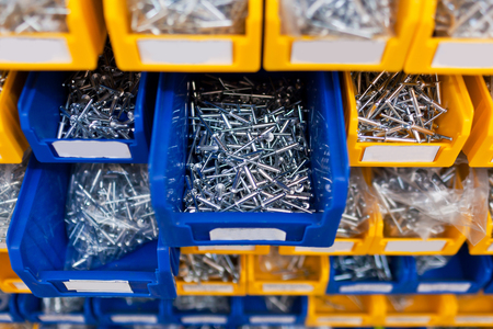 Sorted rivet in boxes in the store.の写真素材