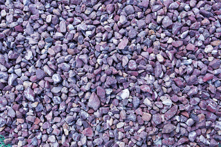 Violet gravel stone floor texture backgroundの写真素材