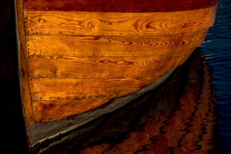 close up of wooden boat in sunlightの写真素材