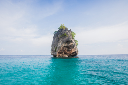 Alone island on wild oceanの写真素材