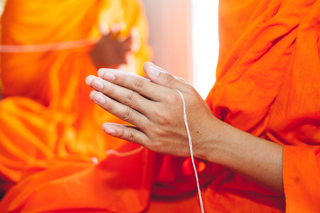 Monk while praying religious ceremonyの写真素材