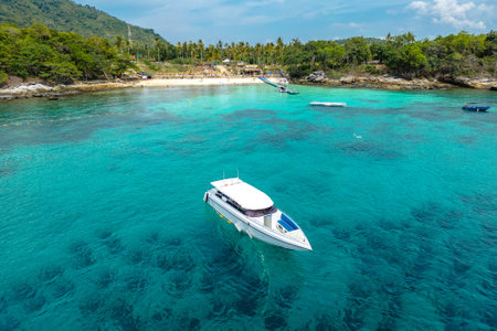 Aerial photo of yacht on the sea and marina. Beautiful yacht blue watersの写真素材