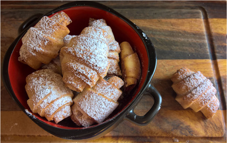 sweet pass croissants with jam, in topping from icing sugar.の写真素材