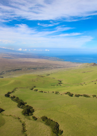 Flying above Hawaii in a helicopterの写真素材